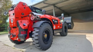 Heckansicht Linde YH60 Teleskoplader beim einfahren in das Zwischenlager 